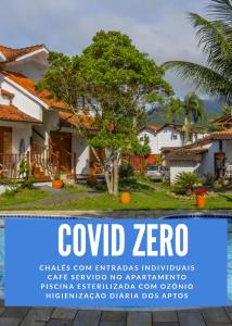 a house with a sign that reads cold zero at Recanto da Praia in Paraty