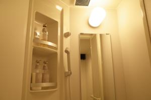 Kupaonica u objektu bnb+Atami Resort