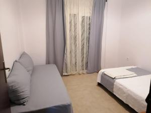 Postel nebo postele na pokoji v ubytování Stef Lux Home of Kriopigi