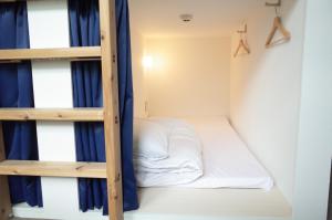 Postel nebo postele na pokoji v ubytování bnb+Atami Resort