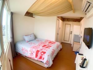 Tempat tidur dalam kamar di 星霖之家