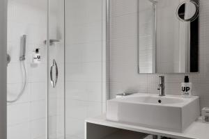 Een badkamer bij Up Hotel