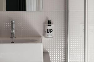 Een badkamer bij Up Hotel