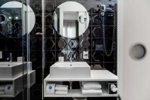 Een badkamer bij Up Hotel