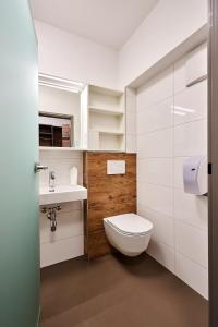 Koupelna v ubytování Huemer-Park Motel Vöcklatal + 9 fotografií