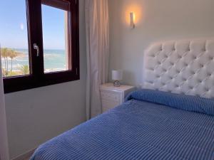 Postel nebo postele na pokoji v ubytování Lubina del Sol - Apartment by the Sea + 37 fotografií