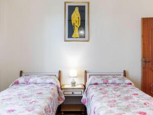 Postel nebo postele na pokoji v ubytování maximum house in subbiano