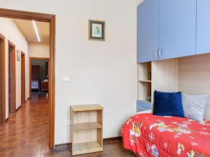 Postel nebo postele na pokoji v ubytování maximum house in subbiano