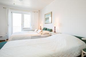 Voodi või voodid majutusasutuse B&B Pletna a Double Lake-View Room toas