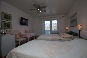 Voodi või voodid majutusasutuse B&B Pletna a Double Lake-View Room toas