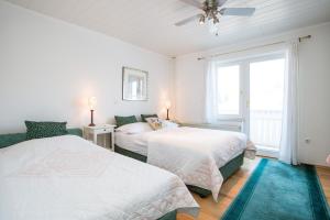 Voodi või voodid majutusasutuse B&B Pletna a Double Lake-View Room toas