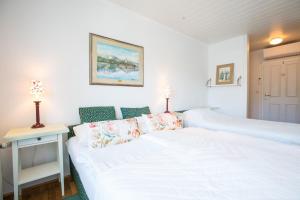 Voodi või voodid majutusasutuse B&B Pletna a Double Lake-View Room toas