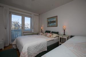 Voodi või voodid majutusasutuse B&B Pletna a Double Lake-View Room toas