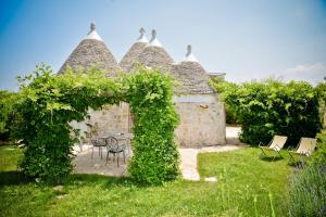 Vonkajšia záhrada v ubytovaní Leonardo Trulli Resort