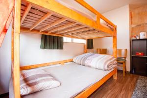 Voodi või voodid majutusasutuse DEER Hostel OSAKA NAMBA toas