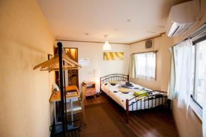 Voodi või voodid majutusasutuse DEER Hostel OSAKA NAMBA toas