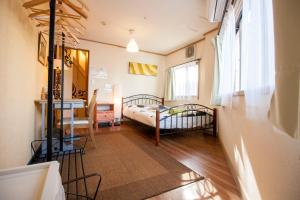 Voodi või voodid majutusasutuse DEER Hostel OSAKA NAMBA toas