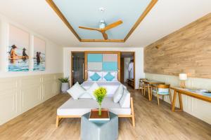 Postel nebo postele na pokoji v ubytování Fusion Suites Vung Tau