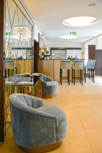 Posezení v ubytování Hotel Czinege & Étterem