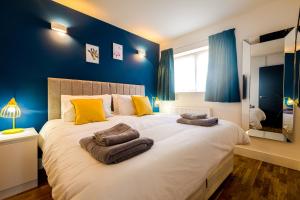 Postel nebo postele na pokoji v ubytování Broadstairs Apartments