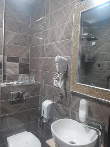 Koupelna v ubytování Hotel Usce