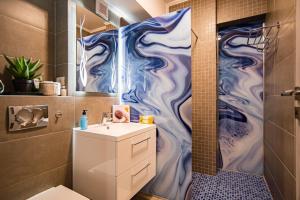 Фотография из галереи Blue Boutique Magic View of the Sea Apartments в Мамае