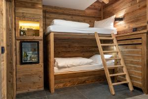 Postel nebo postele na pokoji v ubytování Hotel Majon Miramonti