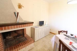 Televízia a/alebo spoločenská miestnosť v ubytovaní In Good Location And With Balcony - Casa Vacanze Nicole In Salento