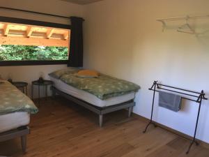 Tempat tidur dalam kamar di A Côté