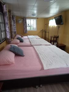 Postel nebo postele na pokoji v ubytování Baan Wang Kaew