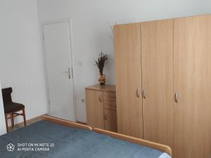 Postel nebo postele na pokoji v ubytování Apartments Davor