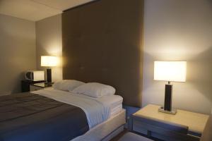 Cama o camas de una habitación en The Mighty Fraser Motel
