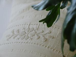 a close up of a flower on a piece of paper at Hotel Mariposas in Villasimius