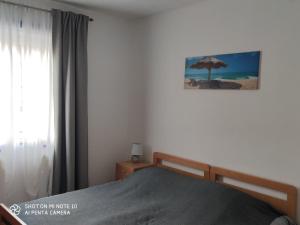 Postel nebo postele na pokoji v ubytování Apartments Davor