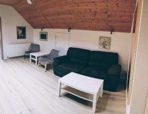 Area soggiorno di Apotek Guesthouse