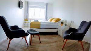 Letto o letti in una camera di Apotek Guesthouse