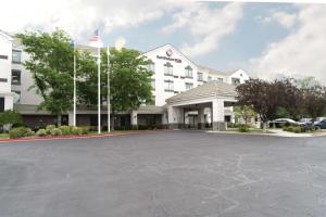 a hotel with an empty parking lot in front of it at Best Western Plus Provo University Inn in Provo