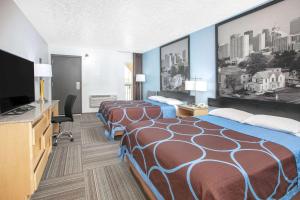 TV o dispositivi per l'intrattenimento presso Super 8 by Wyndham City of Moore