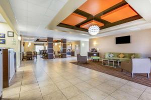 a lobby of a hospital with couches and chairs at La Quinta by Wyndham Angleton in Angleton