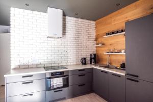 Kuchnia lub aneks kuchenny w obiekcie Apartament ZIELONA