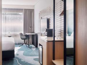 Postel nebo postele na pokoji v ubytování Novotel Tainui Hamilton