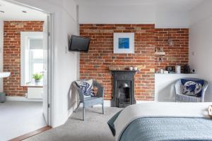 A television and/or entertainment center at The Caledon Guest House 