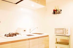 Kuchyň nebo kuchyňský kout v ubytování Hotel Shu + 20 fotografií