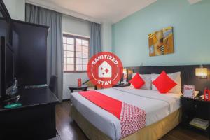 Postel nebo postele na pokoji v ubytování Eureka Hotel