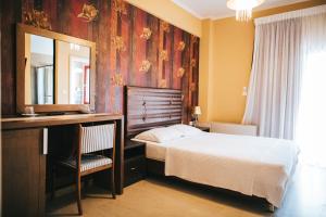 Posteľ alebo postele v izbe v ubytovaní Fanari Hotel