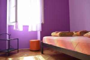 Ένα ή περισσότερα κρεβάτια σε δωμάτιο στο Old Town Hostel Split