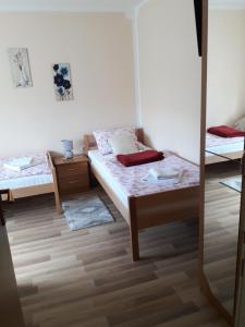 Postel nebo postele na pokoji v ubytování Rooms Luka