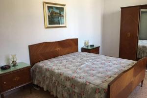 Posteľ alebo postele v izbe v ubytovaní Panorama da Cartolina