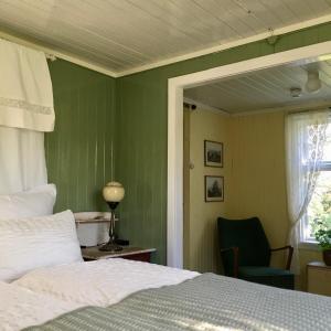 Säng eller sängar i ett rum på Storjord Hotel