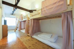 Двухъярусная кровать или двухъярусные кровати в номере Sato-san's Rest